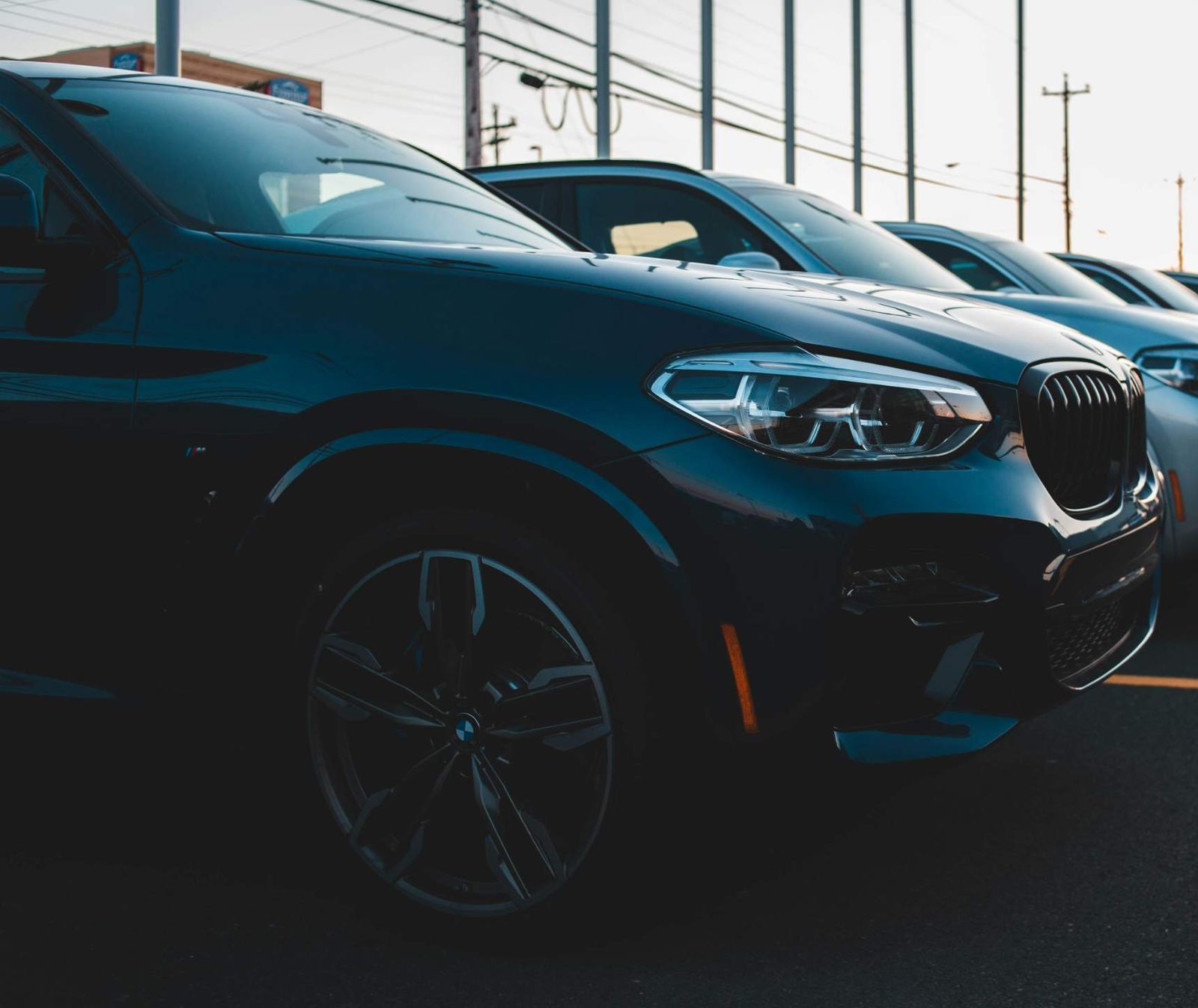 A row of cars on the lot